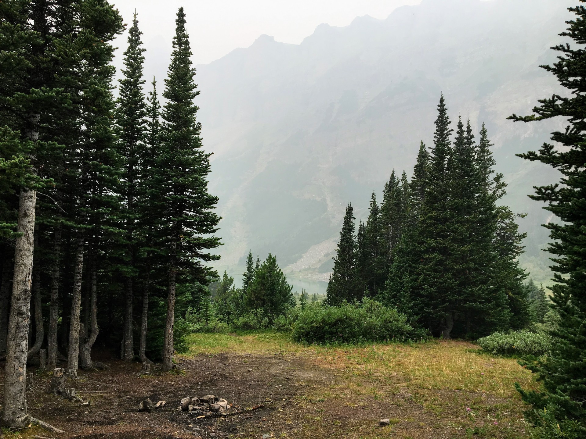 Remote and isolated campground beside hidden lake deep and high in the Canadian rockies.  Pure Solitude.